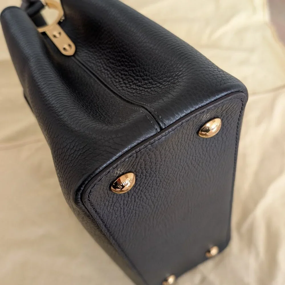 Louis Vuitton Taurillon Capucines PM Black Fuchsia